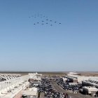 Before landing, 40 Hornets flew over the base in formation.